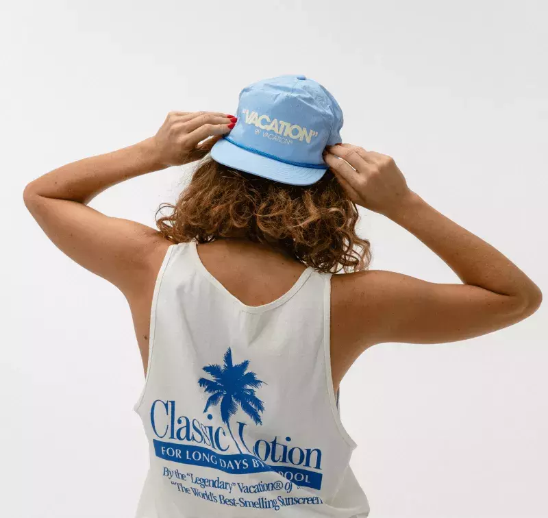 back profile of light blue vacation hat